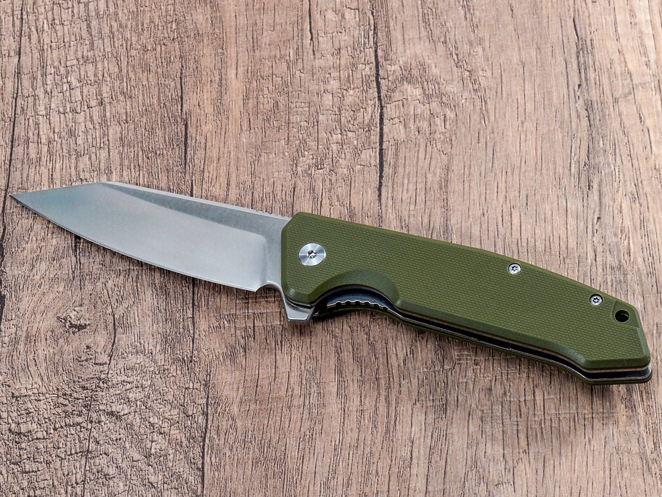 Coltello con impugnatura in G10 verde