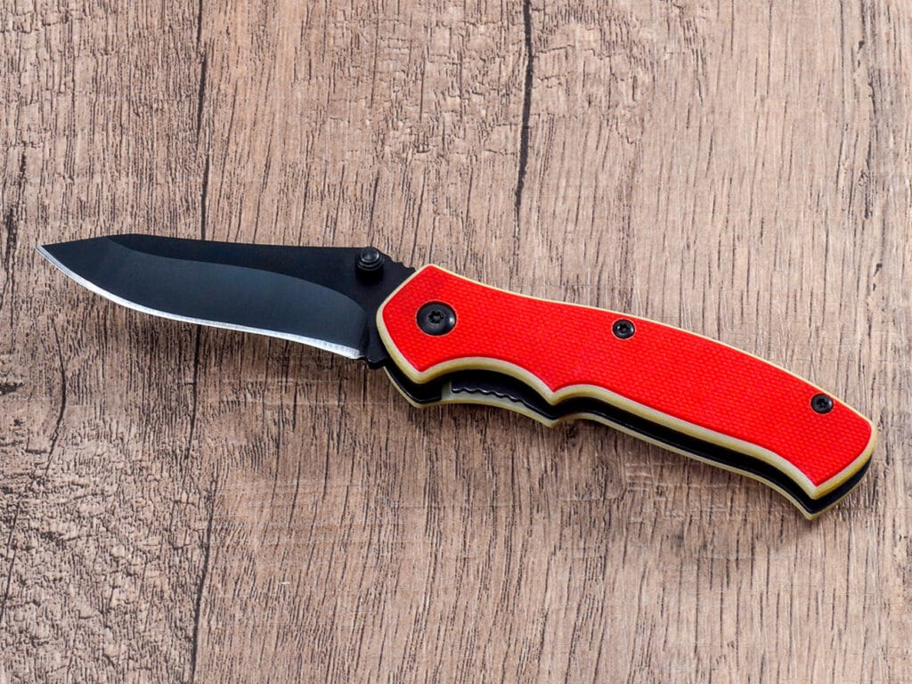 Ніж з ручкою G10 і чорним кишеньковим затискачем